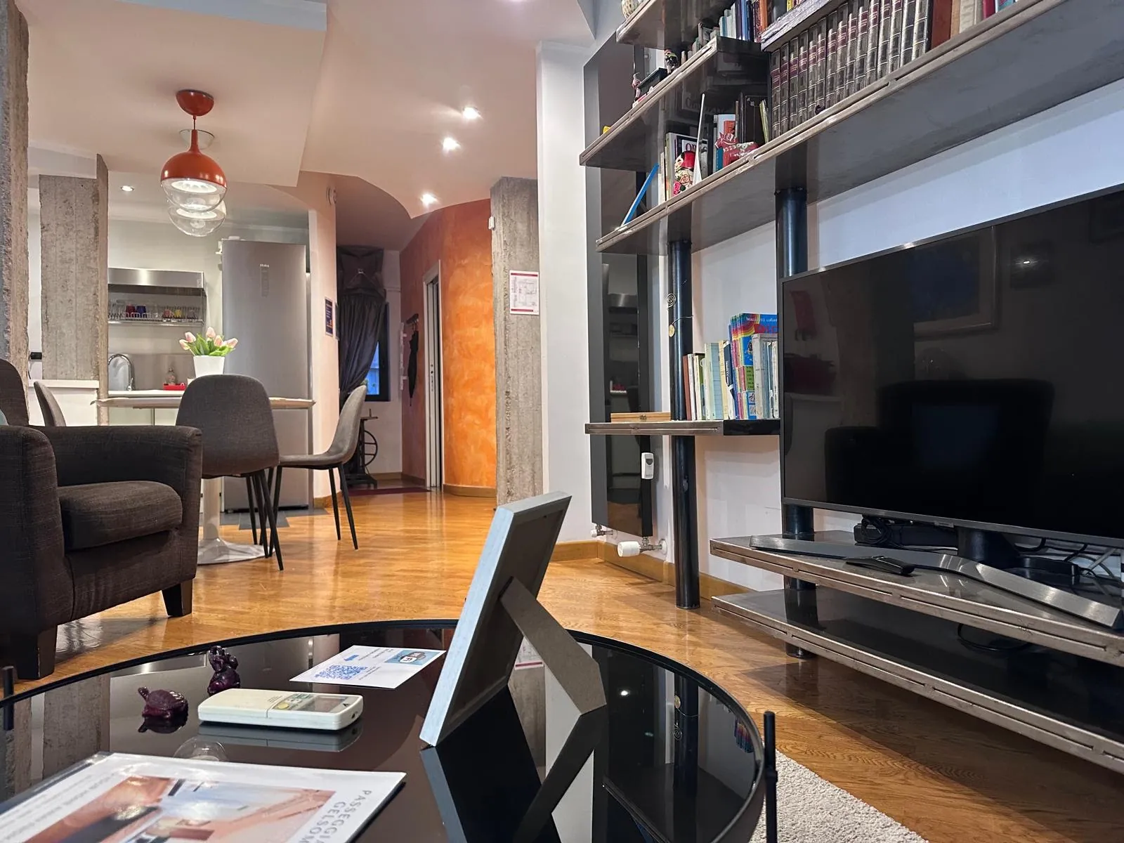 Living room with bookcase and Smart TV